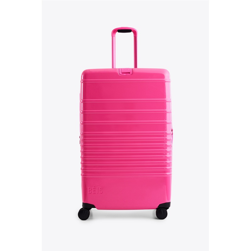 The Large Check-In Roller in Barbie Pink